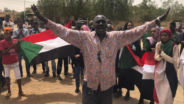 A Sudanese protester shouts slogans during a demonstration against the military council in Khartoum, Sudan.