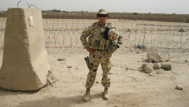 RSL Queensland's manager of veteran services, Rob Skoda - pictured during one of his tours of duty - says transitional education is badly needed before veterans leave the defence forces.