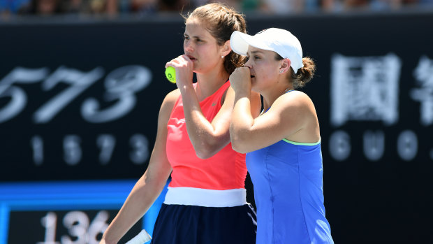 Tactical battle: Ashleigh Barty of Australia and Julia Goerges of Germany during their Australian Open women's doubles second-round match against Timea Babos of Hungary and Kristina Mladenovic of France.