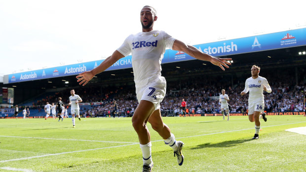 Top start: Leeds United's Kemar Roofe celebrates scoring his side's second goal against Rotherham.