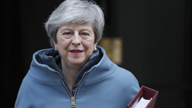 British PM Theresa May has lost three MPs who have left to join a breakaway group from Labour.