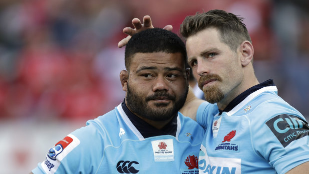 Bernard Foley consoles Tolu Latu. 