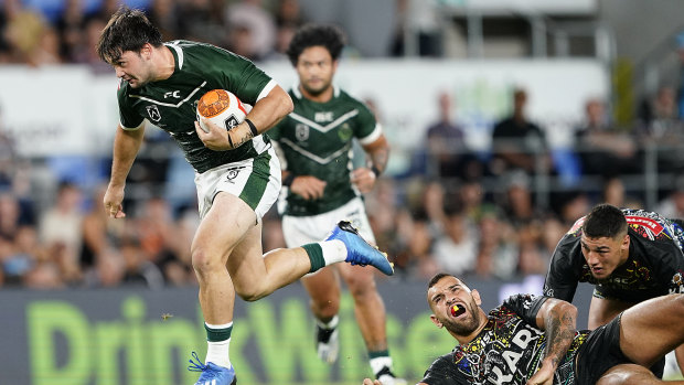 Brandon Smith of the Maori Kiwis breaks free at CBus Super Stadium on the Gold Coast.