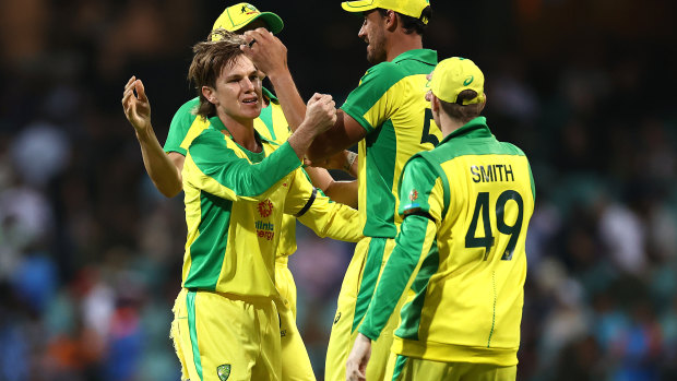 Adam Zampa of Australia celebrates after taking the wicket of Hardik Pandya of India during game one of the One Day International series between Australia and India at Sydney Cricket Ground.