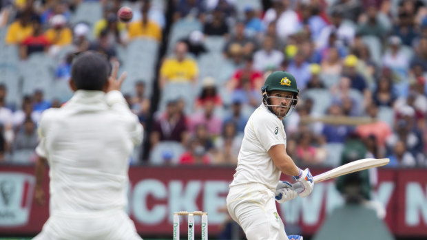 Aaron Finch looks on as he is caught out for three on day four of the Boxing Day Test.