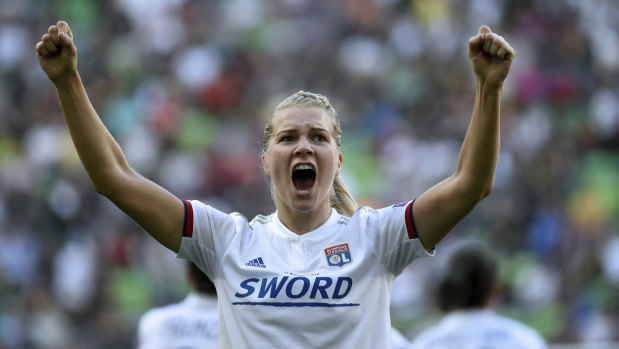Ada Hegerberg celebrates  one of her three goals en route to Lyon's Champions League win.