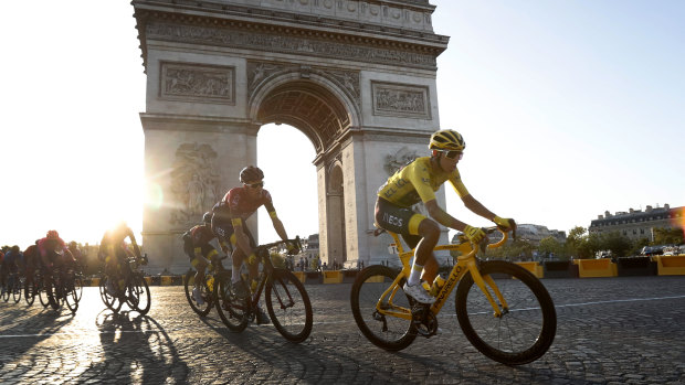 Stunning rise: Bernal passes the Arc de Triomphe.