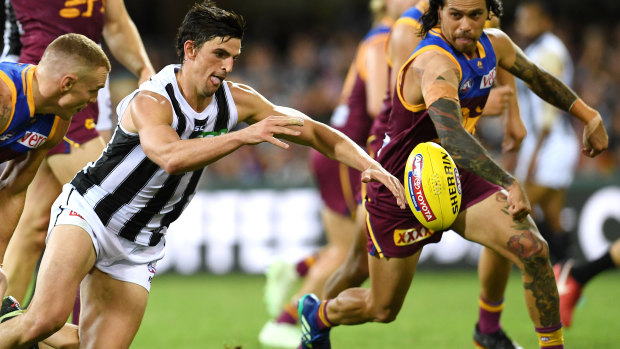Top flight: Magpies playmaker and captain Scott Pendlebury in action against the Lions during the round seven clash at the Gabba.
