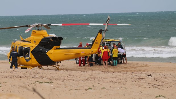 The man was airlifted from the beach.