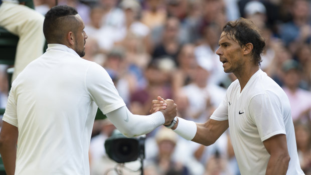 A fraction of friction: Nick Kyrgios and Rafa Nadal after the Spaniard's win at Wimbledon in 2019.