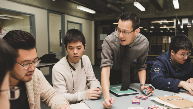 Eddie Woo in his element, running a special workshop for specialist maths students at Hawker College in Canberra.