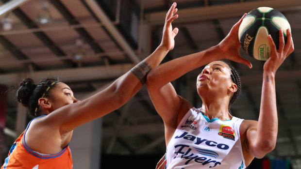 Liz Cambage heads for the basket.