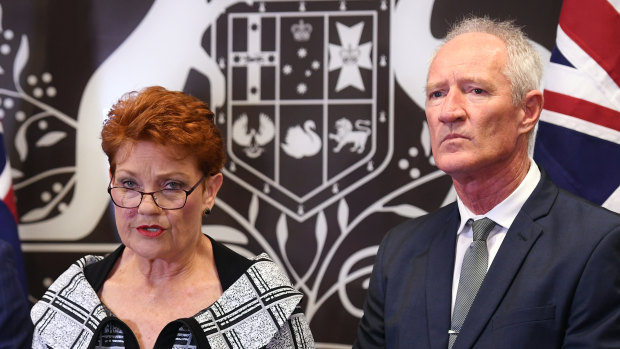 Queensland senator and One Nation leader Pauline Hanson, flanked by party official Steve Dickson.