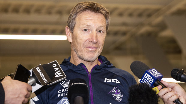 Decisions to make: Melbourne Storm coach Craig Bellamy speaks to the media at Melbourne Airport.