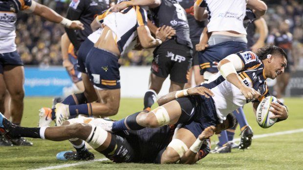 Pleasure and pain: Pete Samu scores off the back of a Brumbies rolling maul. 