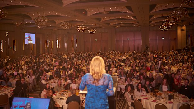 Emma Isaacs speaks at a Business Chicks event in Melbourne: “The events are joyful,” says one member, “like school reunions without the mean girls.”