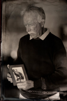 Bob Pearson was a tracker dog handler in Vietnam. In this image taken using wet plate photography, he’s holding a portrait of Julian, his canine partner in Vietnam.