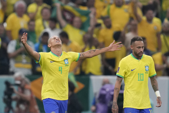 Richarlison celebrates the first goal of his second-half double for Brazil.