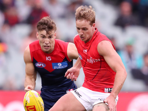 Darcy Parish, right, set the tone for the Bombers in the middle. 