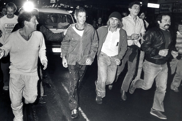 Cliff Young crossing the finishing line in the 1983 Sydney-Melbourne Marathon at 1.35am.