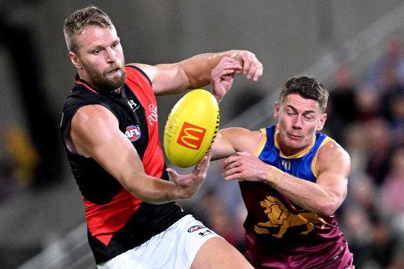 Jake Stringer and Dayne Zorko during the round nine clash between Essendon and the Brisbane Lions.