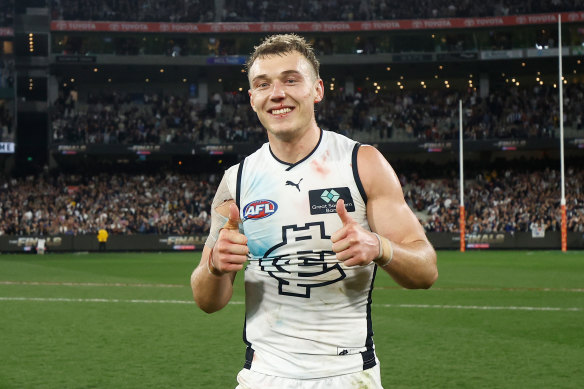 Happy Days: Patrick Cripps battled a bleeding nose to help edge the Blues to victory over the Demons.