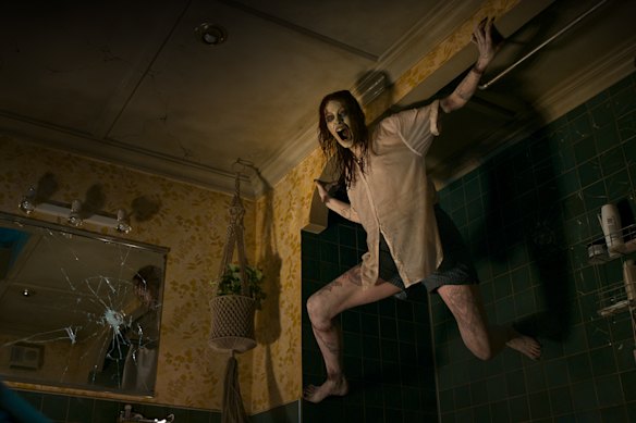 Alyssa Sutherland in a scene from Evil Dead Rise.