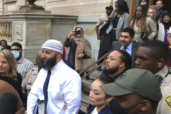 Adnan Syed, centre, leaves the courthouse on Monday, in Baltimore.