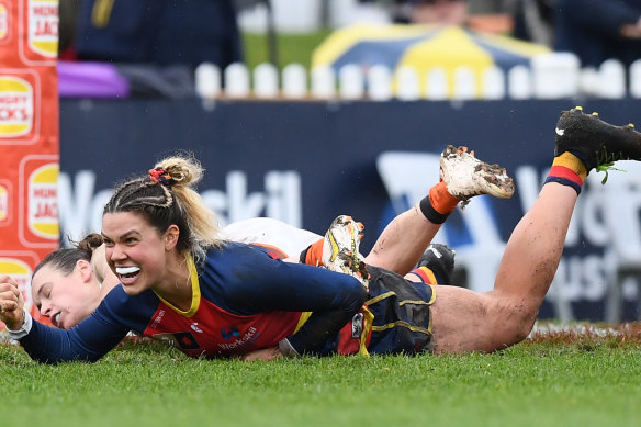 Adelaide’s Anne Hatchard celebrates a goal.