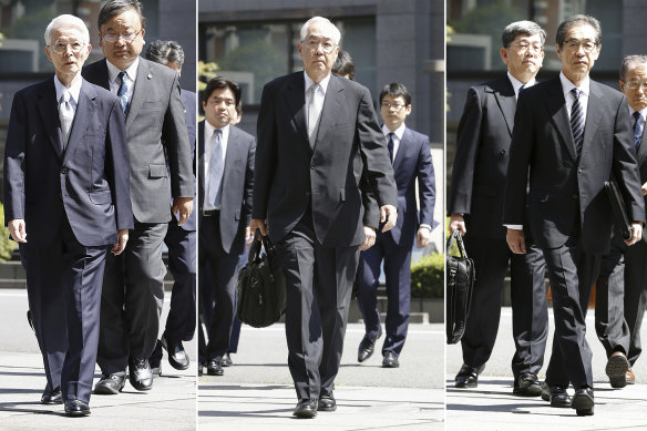 Former Tokyo Electric Power Co chairman Tsunehisa Katsumata and vice-presidents Sakae Muto and Ichiro Takekuro arrive at Tokyo District Court on Thursday.