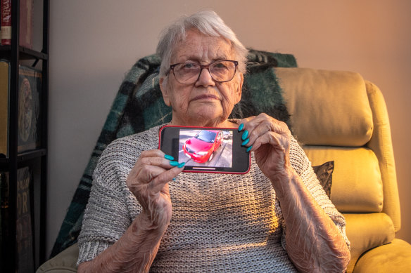 Jayne with a picture of her recently sold car. 