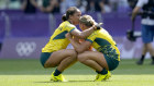 Austral console each other after the loss.ia’s Faith Nathan, left and teammate Australia’s Teagan Levi