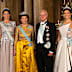 King Carl XVI Gustaf of Sweden with Queen Silvia and their daughters Crown Princess Victoria (right) and Princess Madeleine (left) in 2025 at the Royal Palace.