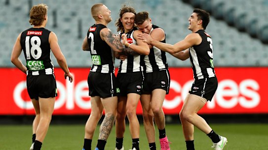 MELBOURNE, AUSTRALIA - JULY 31: Jack Ginnivan of the Magpies celebrates a goal during the round 20 AFL match between Collingwood Magpies and West Coast Eagles at Melbourne Cricket Ground on July 31, 2021 in Melbourne, Australia. (Photo by Darrian Traynor/Getty Images)