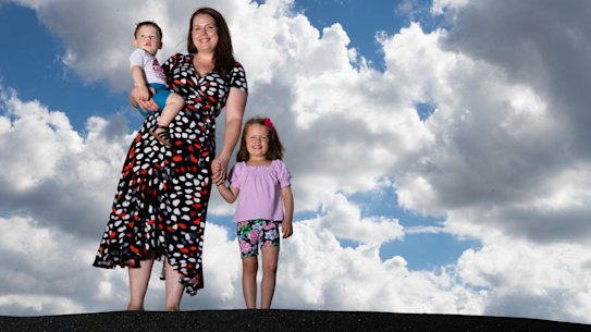 Sarah Smith, with her four-year-old daughter Ariella and 18-month-old son Aidan. She’s returned to work full time aided by changes to the childcare subsidy and a flexible workplace model.