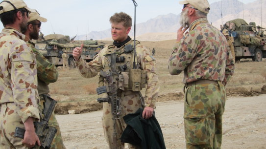 Keith Wolahan (centre) in Kandahar, Afghanistan, in February 2010.  