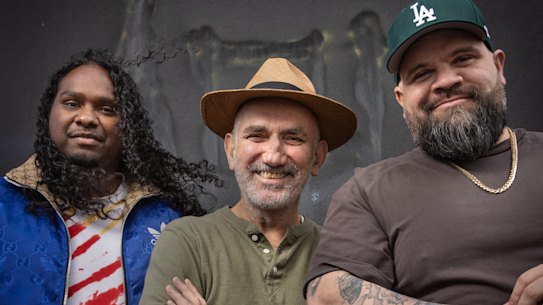 Indigenous rappers Baker Boy (left) and Briggs (right) with singer-songwriter Paul Kelly (centre).