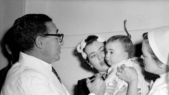 Children receiving salk vaccine. Taken on 5 July 1956.