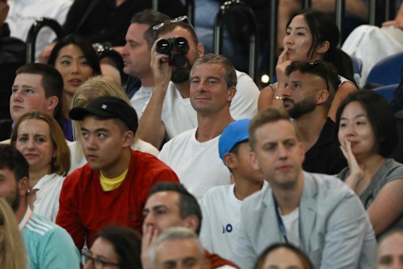 Bear Grylls watches on.