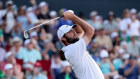 Scottie Scheffler plays his shot from the 17th tee during the final round of The Players Championship at TPC Sawgrass.