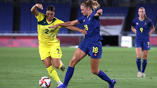 Matildas captain Sam Kerr is challenged by Sweden’s Fridolina Rolfo.