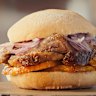 Pan con chicharron … a pork sandwich with slices of sweet potato and salsa criolla.