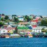 Colourful homes dominate the barren landscape of the capital city of the windblown islands in the South Atlantic Ocean.