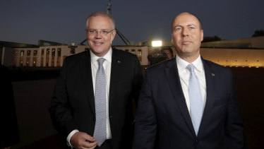 Prime Minister Scott Morrison and Treasurer Josh Frydenberg. The deficit shows the government is on track to record a razor thin surplus before the end of the financial year.