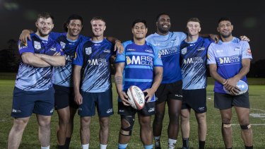 Western Sydney Two Blues players Ethan Caine, Irie Papuni, Tom Curtis, JP Sauni, Manasa Rokosuka, Joe Bedlow and Sione Fifita before training at their home ground in Merrylands. 