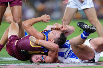 Down day: The Roos were crushed by the Lions.