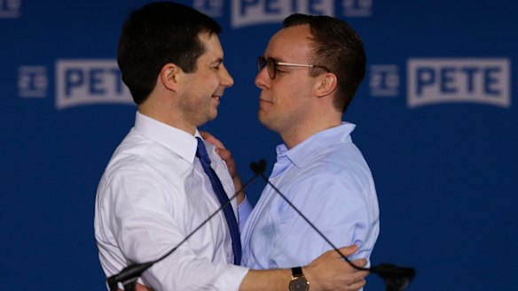 Pete Buttigieg, left, is joined by his husband Chasten Glezman after announcing he will seek the Democratic presidential nomination.