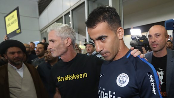 Welcome home: Craig Foster and Hakeem al-Araibi at the refugee footballer's return to Melbourne last month.