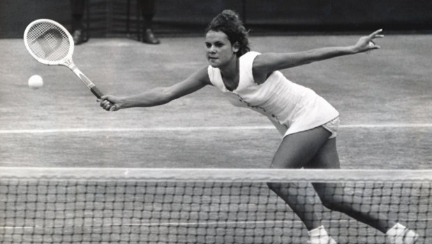 A 19-year-old Evonne Goolagong Cawley at full stretch at Wimbledon in 1971.