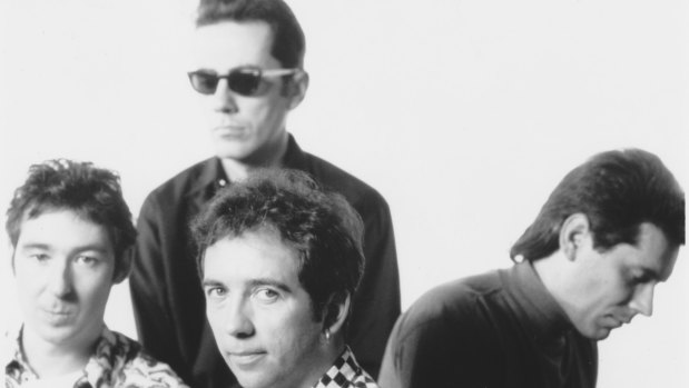  Pete Shelley [front, centre], singer, songwriter and founding member of the band, 1990.